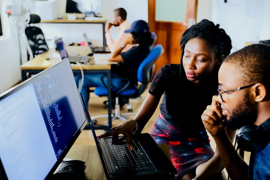 Engineers reviewing an automation workflow