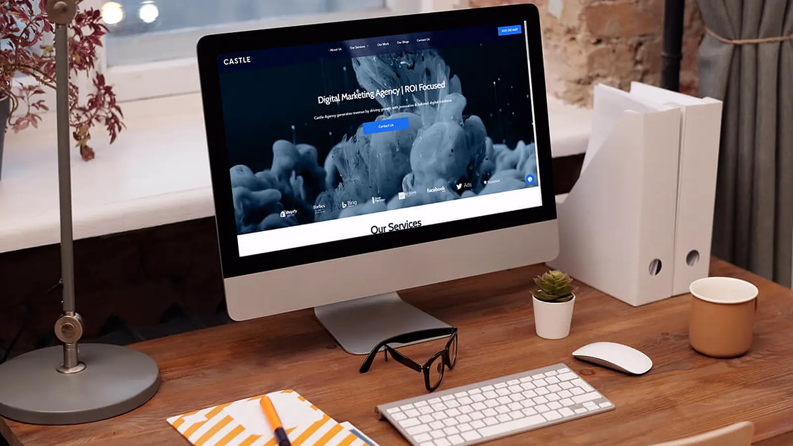 A Castle-built website on a desktop screen in the studio