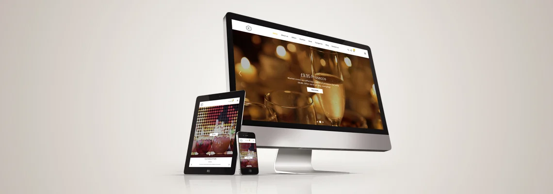 An Apple computer, an iPad and an iPhone all showing the Essential website homepage.