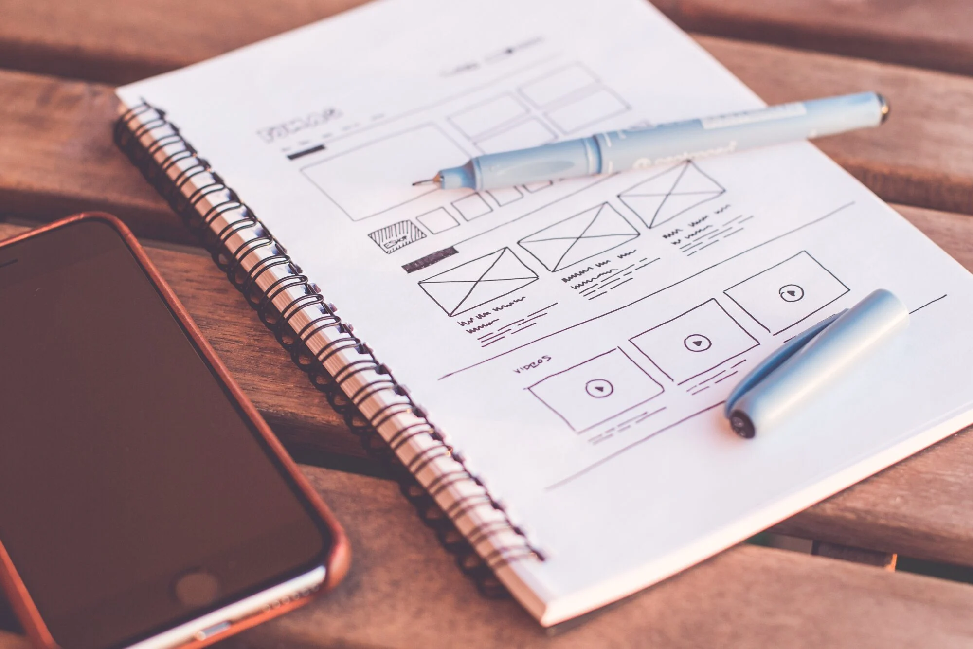 A notepad with a selection of framework designs.
