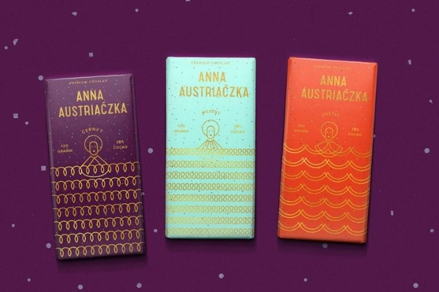 Three decorative chocolate bar packaging designs on a purple background Three decorative chocolate bar packaging designs on a purple background