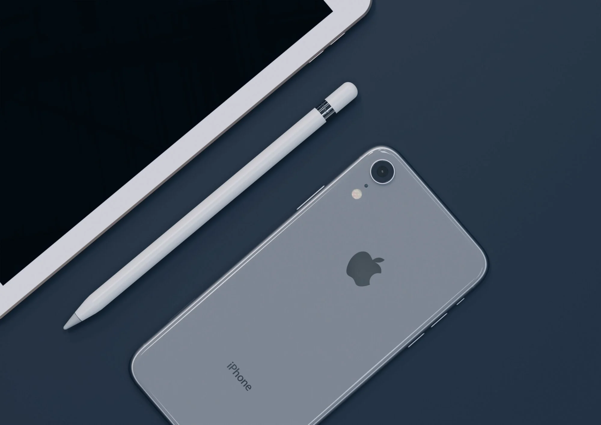 An iPhone facing down on a desk.