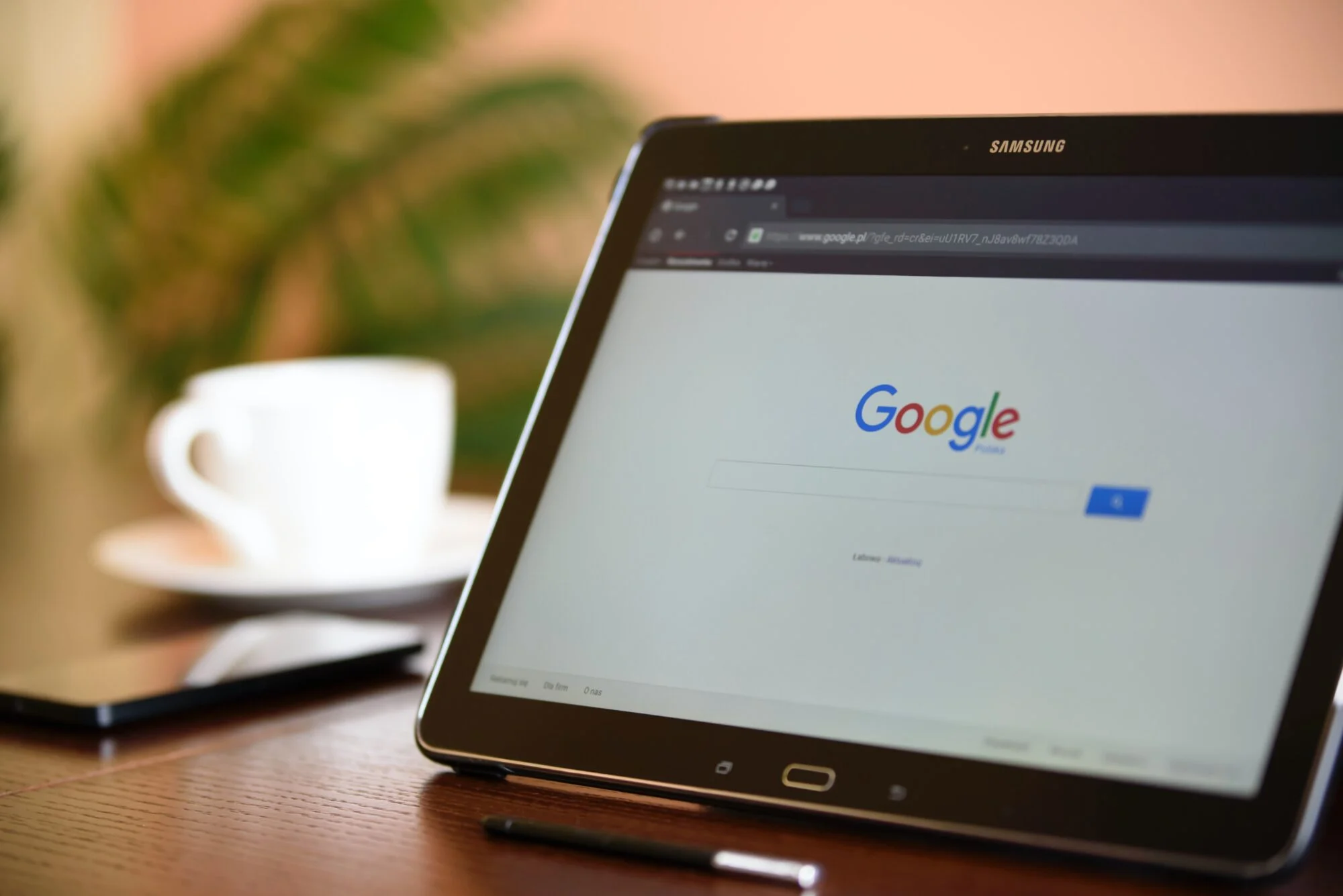 The Google website displayed on an iPad.