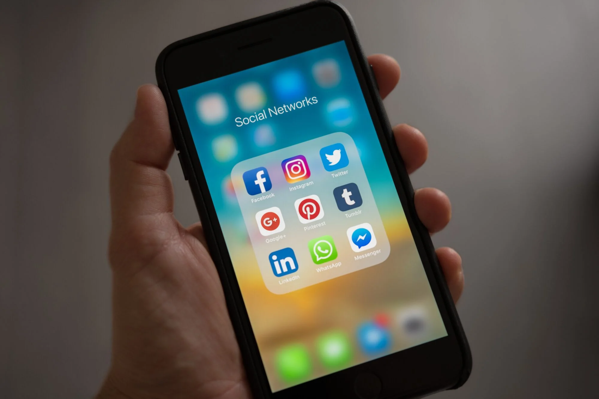 A selection of social media apps displayed on an iPhone. 