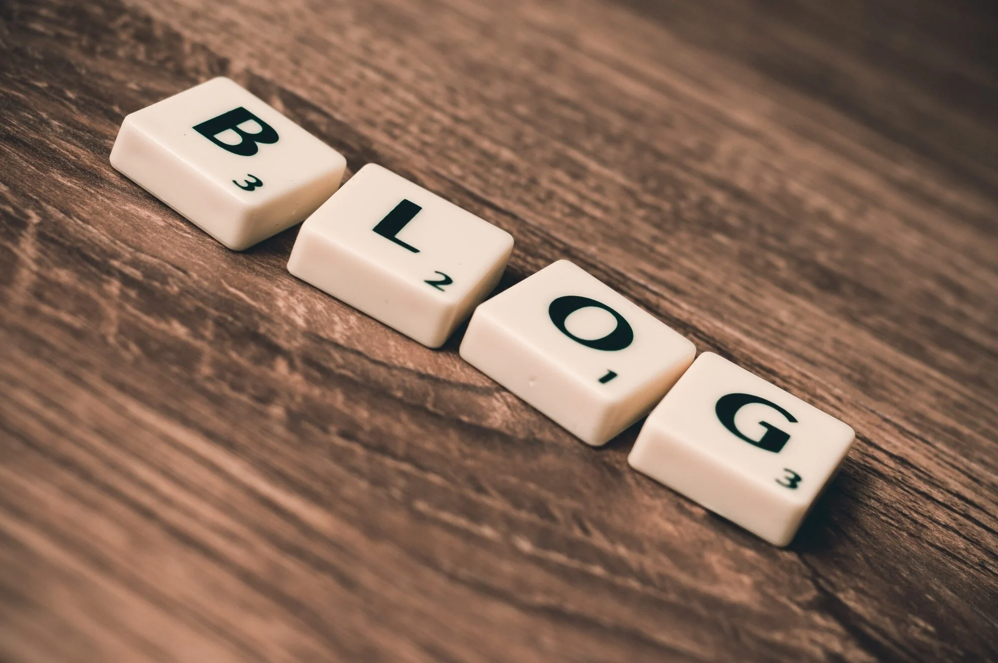 A scrabble set spelling the word "Blog" 