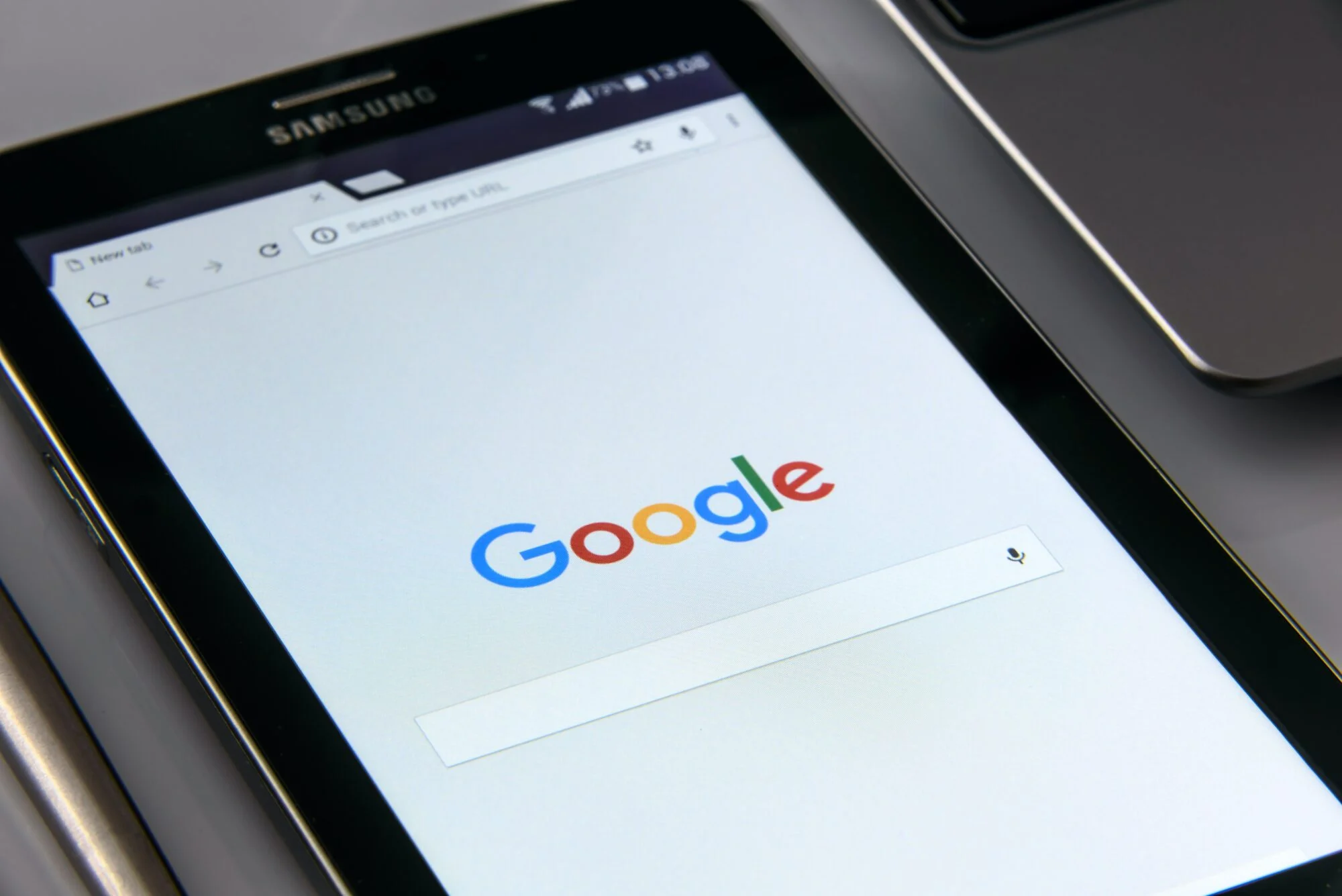 The Google website displayed on an iPad. 