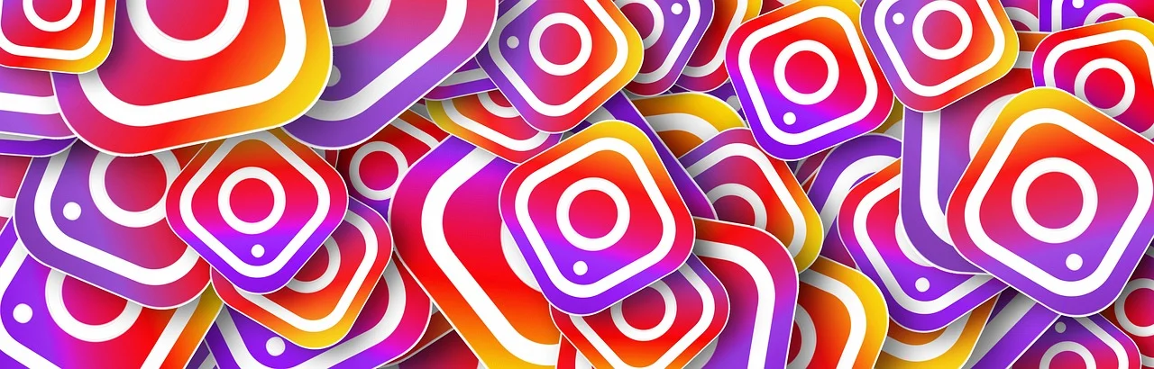 A bunch of instagram logos overlapping eachother.