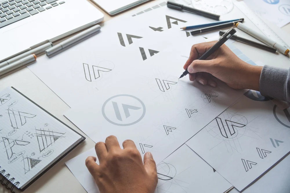 A graphic designer working on a brand to figure out what is product branding.
