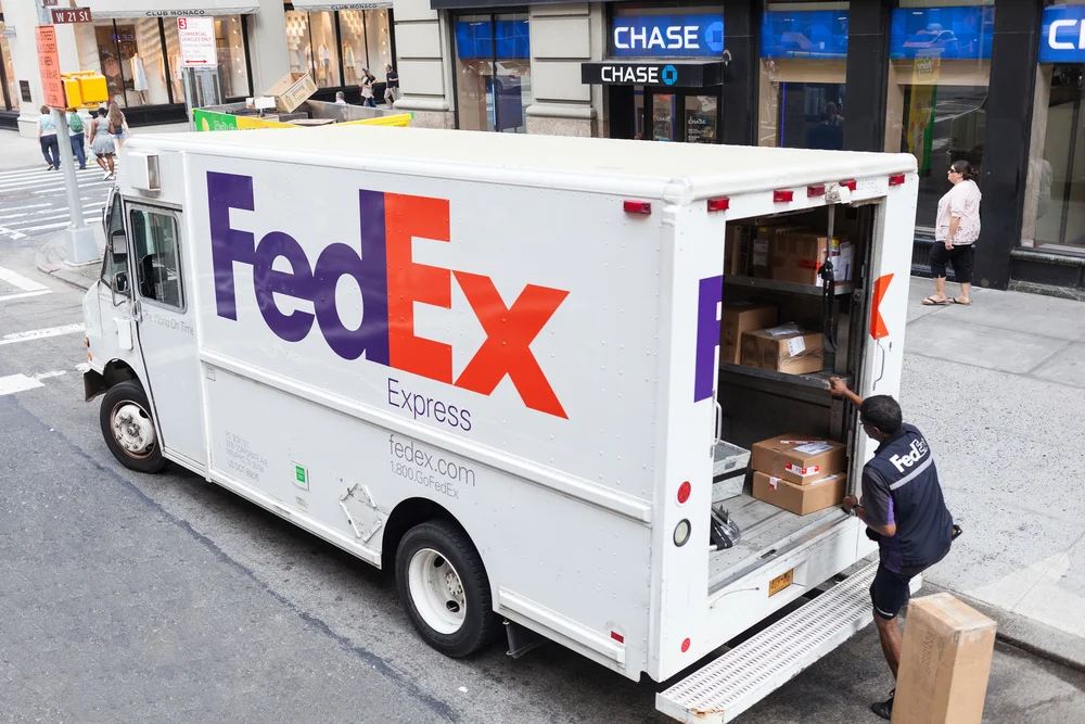 A FedEx Express van showcasing what is corporate branding. 