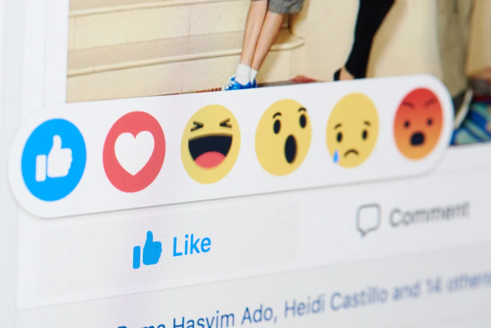 A Facebook post with someone liking the post to show how like reactions work on Facebook.