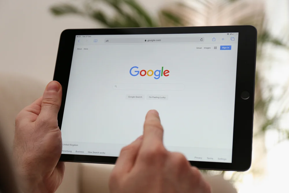 An iPad with Google open to show what are duplicate meta descriptions. 