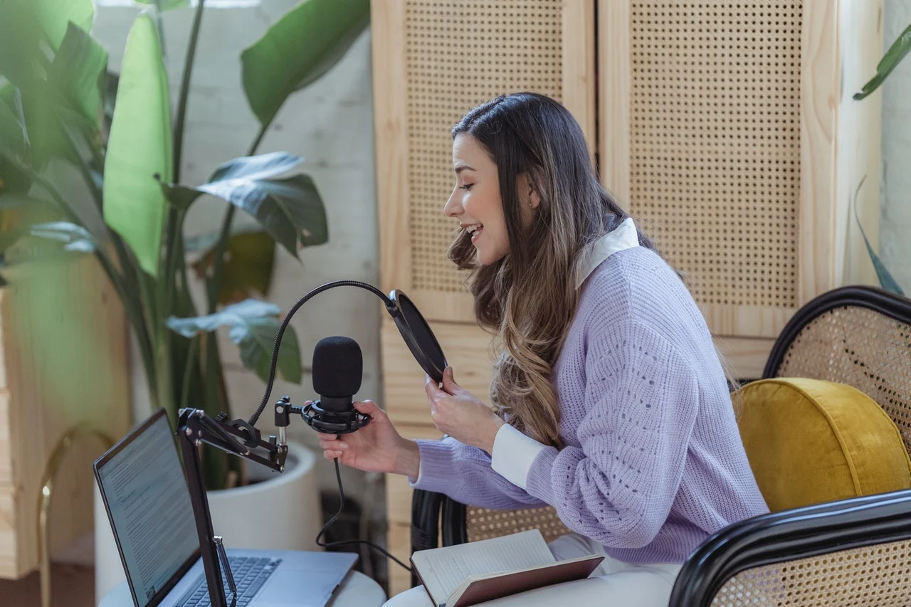 An influencer providing audio for a video explaining when did influencer marketing grow in popularity. 