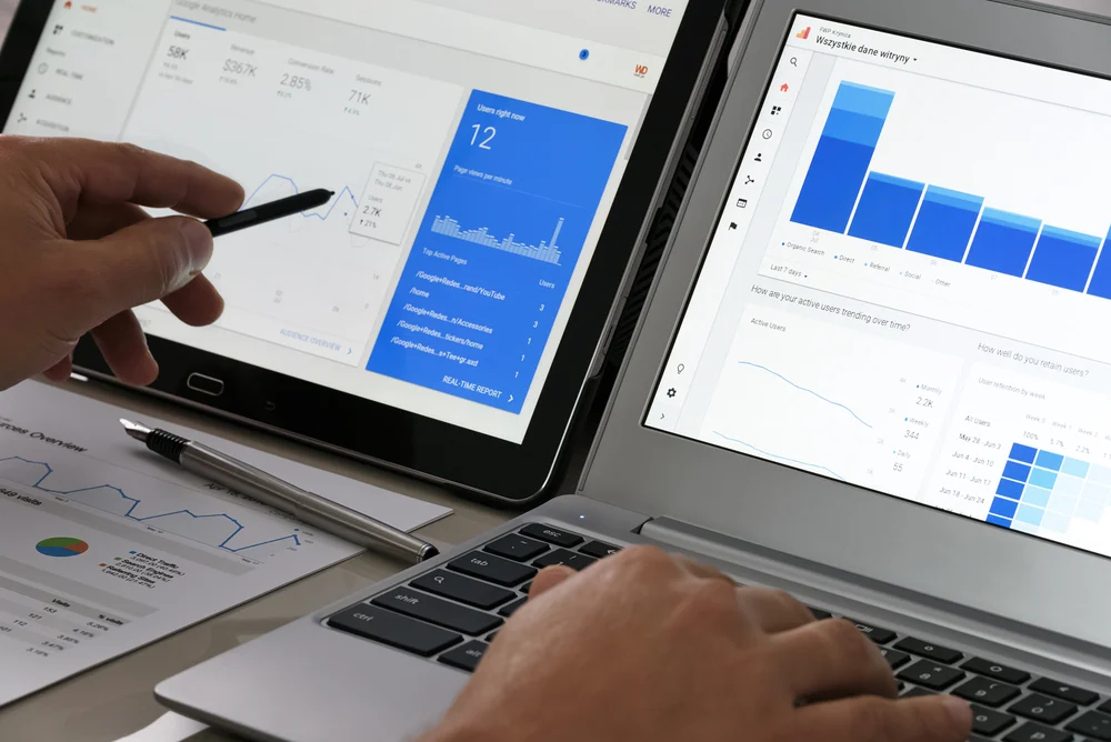 An SEO specialist reviewing data on Google Analytics to find out what is their bounce rate percentage. 