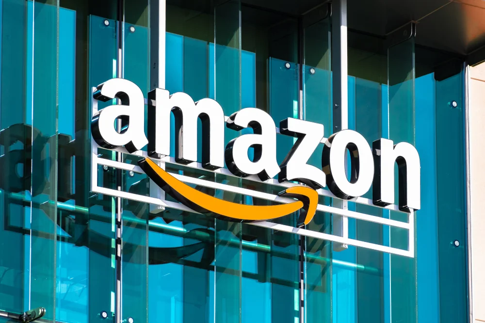 The Amazon logo outside of one of the Amazon buildings showcases the importance of the arrow in the logo for corporate branding. 