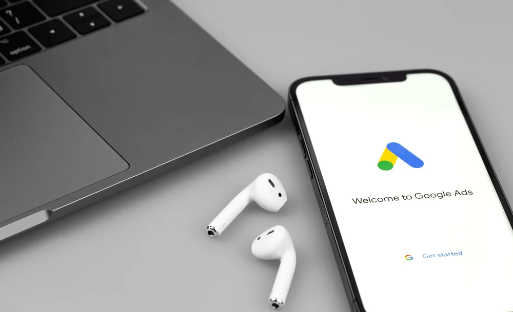 A screenshot of the Google AdWords app opening on an iPhone. 