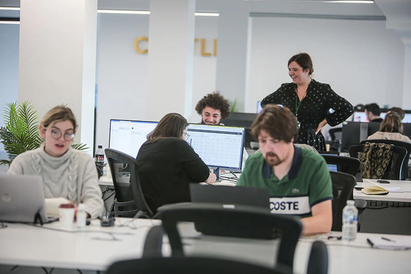 Castle Int. team at work in the open-plan office in Liverpool
