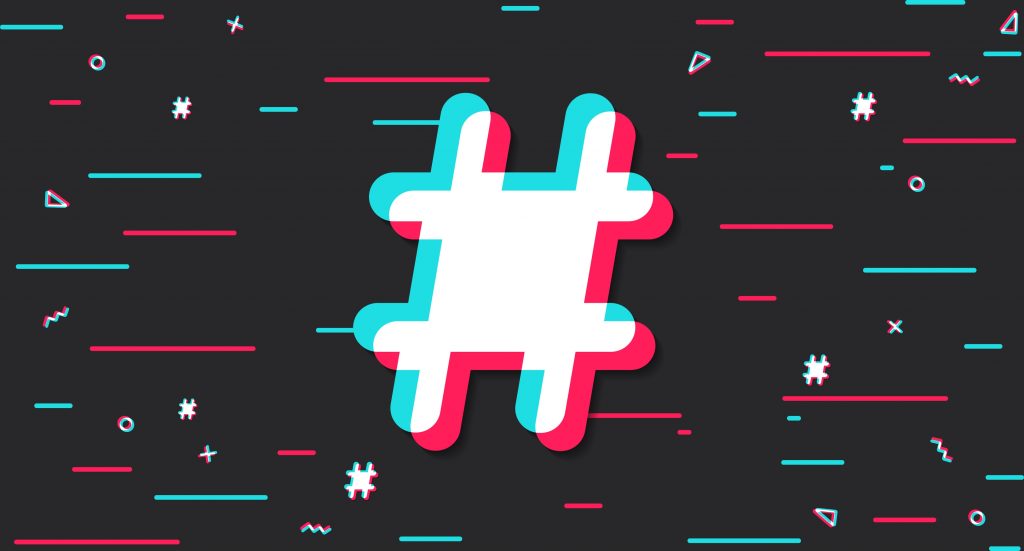 A white hashtag utilising the TikTok brand style, with blue and pink detailing on a black background.