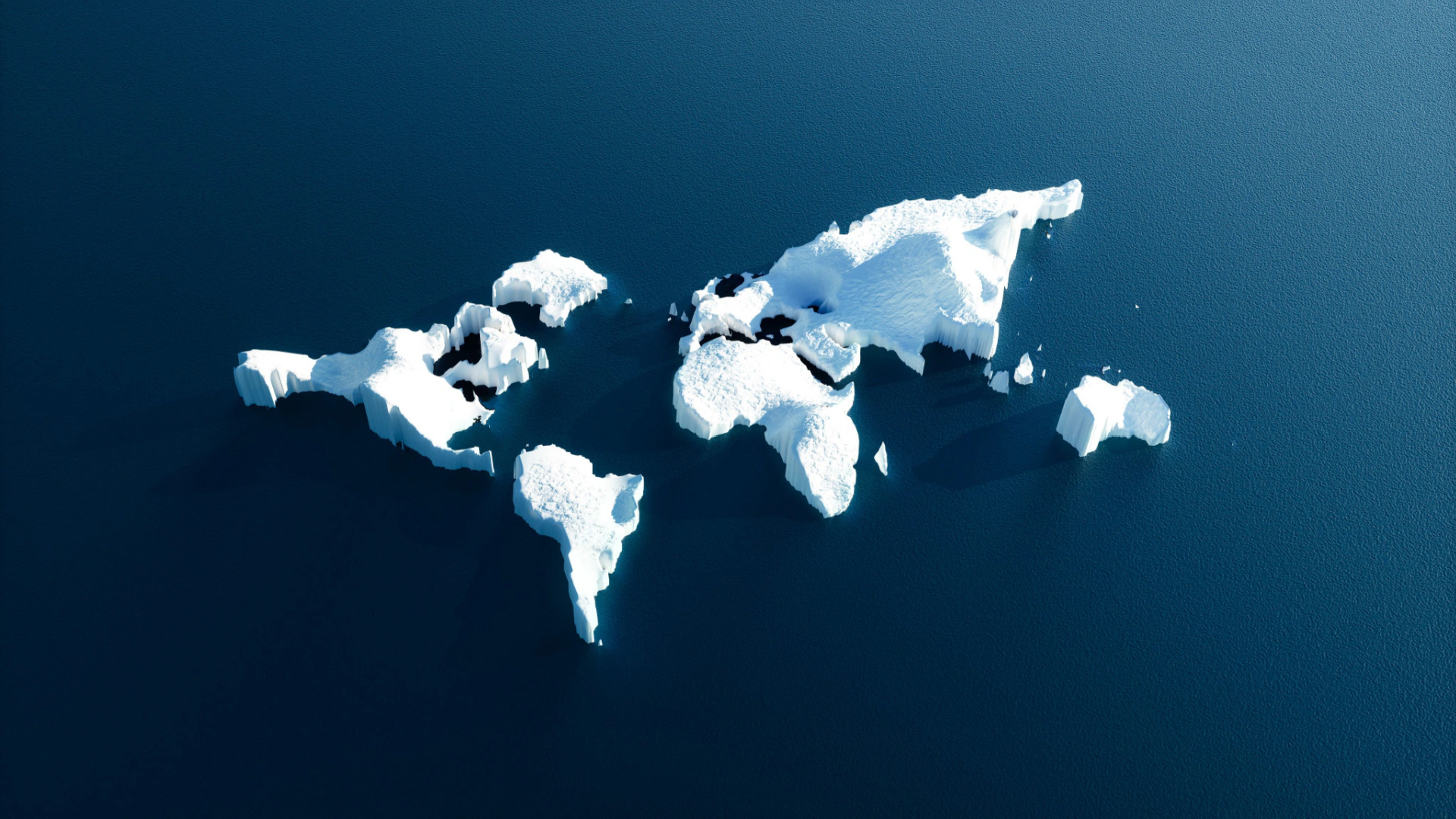 World map formed from ice floating in a deep blue ocean
